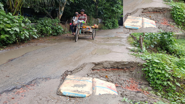 শাহজাদপুরের জামিরতা-গুধিবাড়ী সড়ক নয়, যেন মরণফাঁদ!!